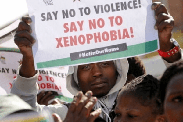 Refugees forced to sleep outside Durban police station amid rising xenophobic violence