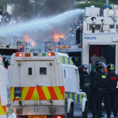 Belfast, Northern Ireland: Police fire water cannon on second night of as anti-immigrant protests
