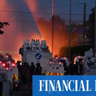 Belfast police brace for second night of unrest as anti-immigration riots turn violent