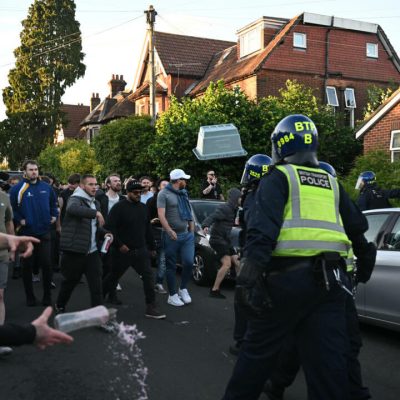 'I can't breathe': Protesters attack police at UK rally over student murder