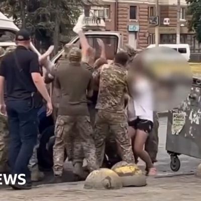 Why are Ukraine's military recruiters facing violence in their own country?