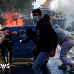Violent clashes between police and protesters in Albania